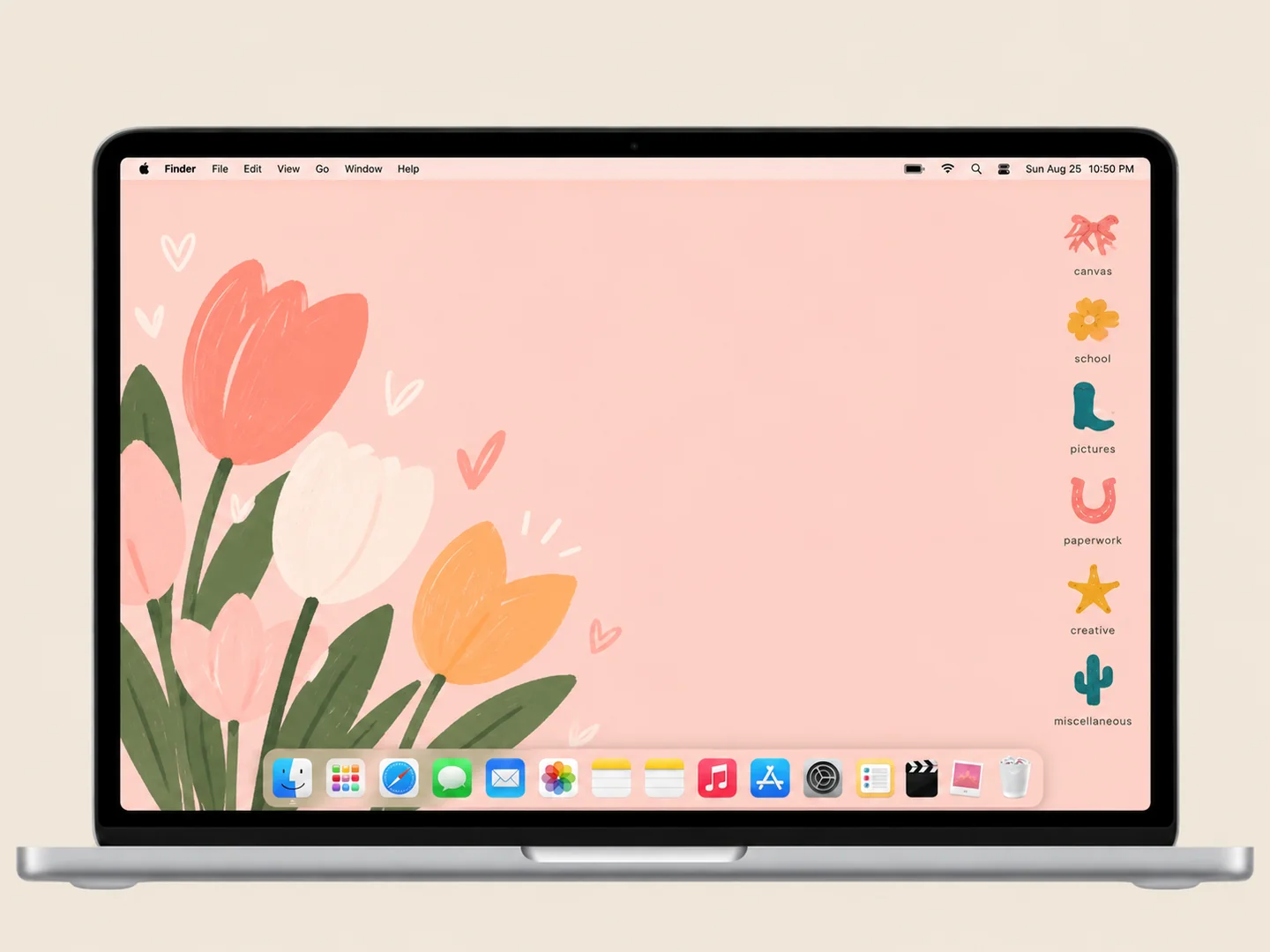 AI concept: peach desktop & playful folders with coordinated wallpaper and folder icons on a front-facing silver laptop.
