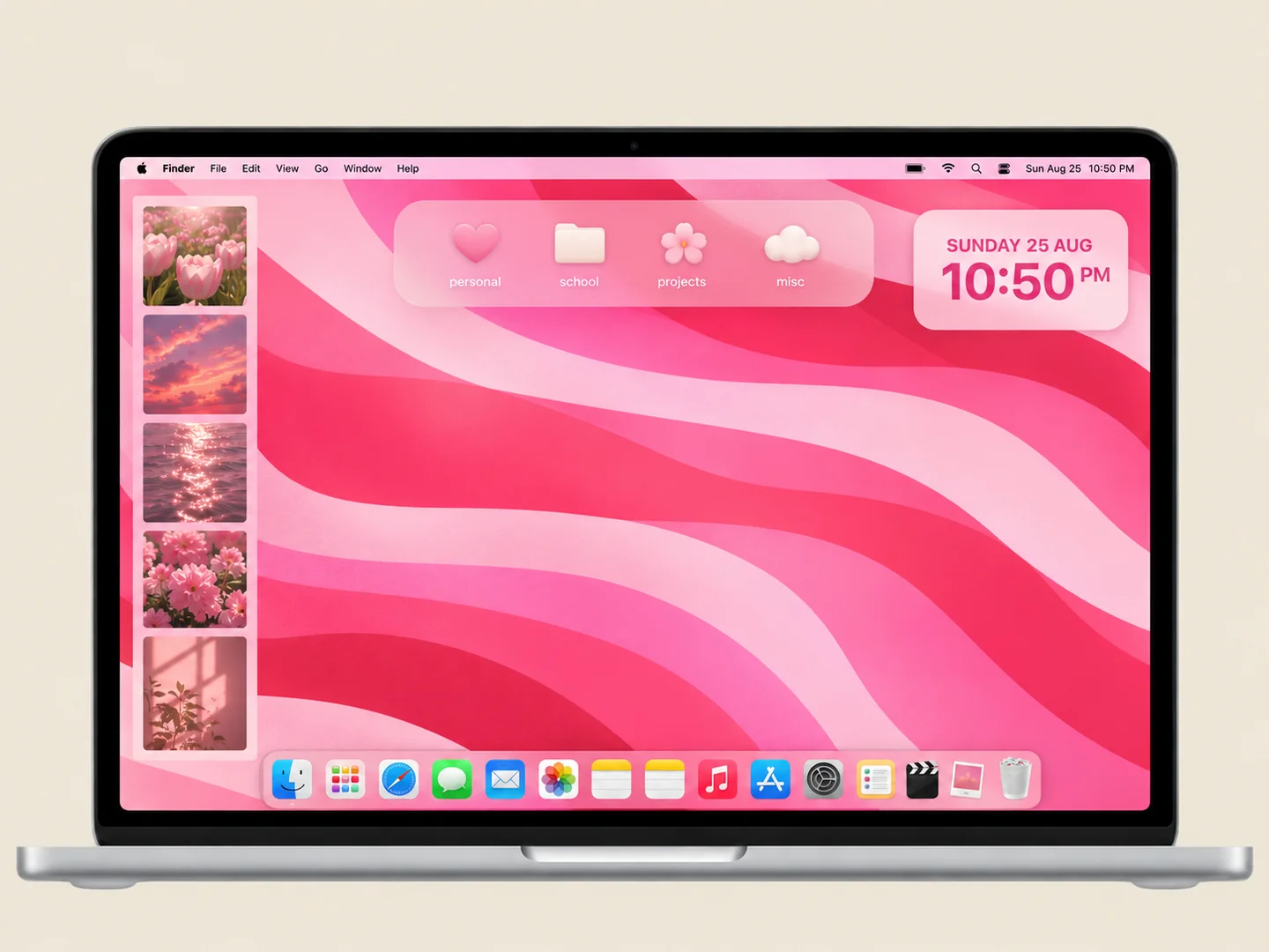 AI concept: pink waves & minimal folders with coordinated wallpaper and folder icons on a front-facing silver laptop.